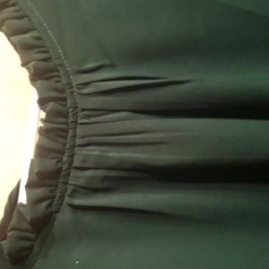 Beauiful silk blouse ruffs on the arm